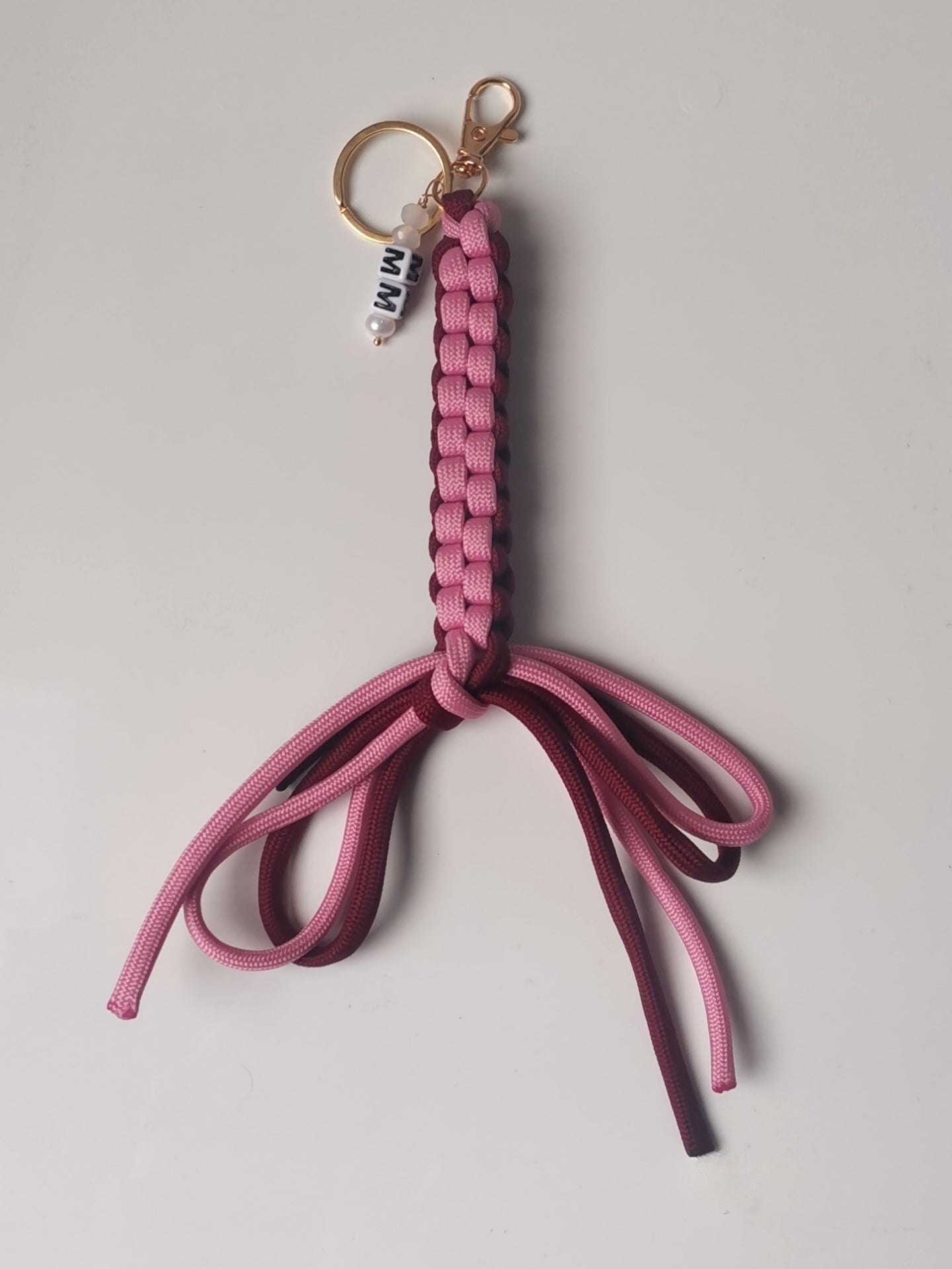 Bag charm with bow light pink and bordeaux