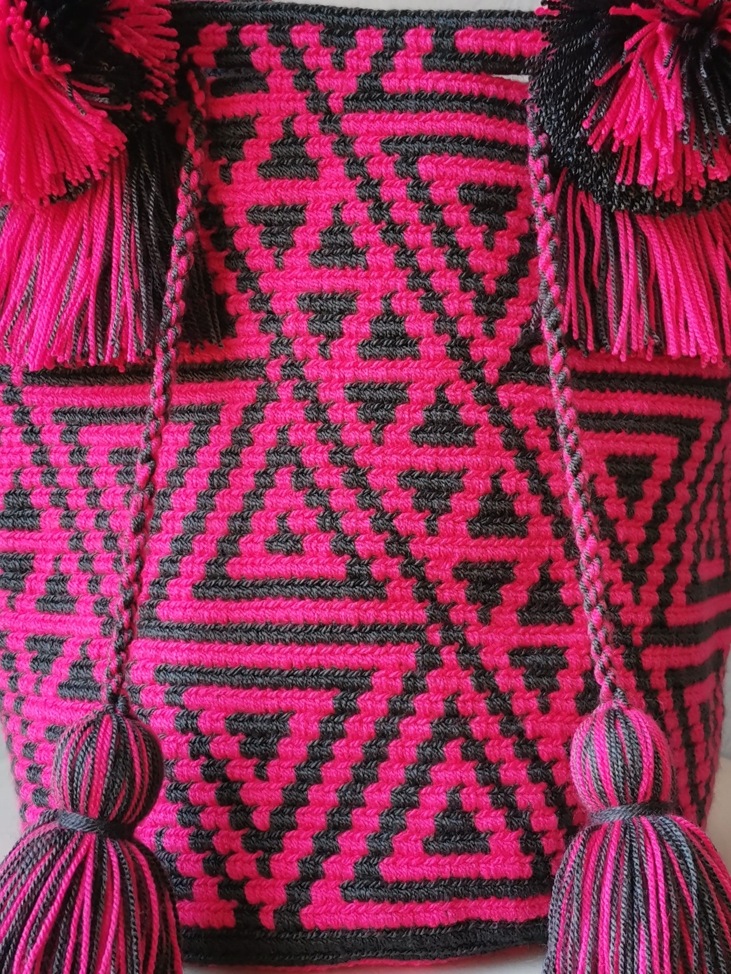 FINE SERIE - Borsa mochila a mano M grigio scuro e rosa acceso