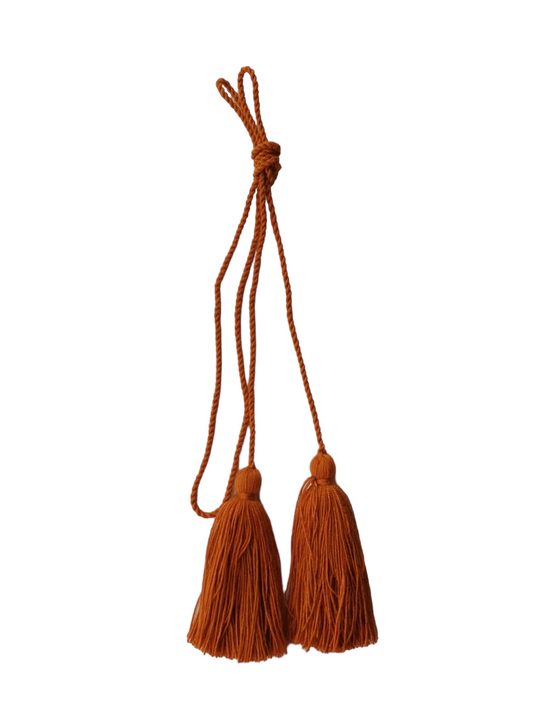 Shoulder bag with mustard yellow tassels