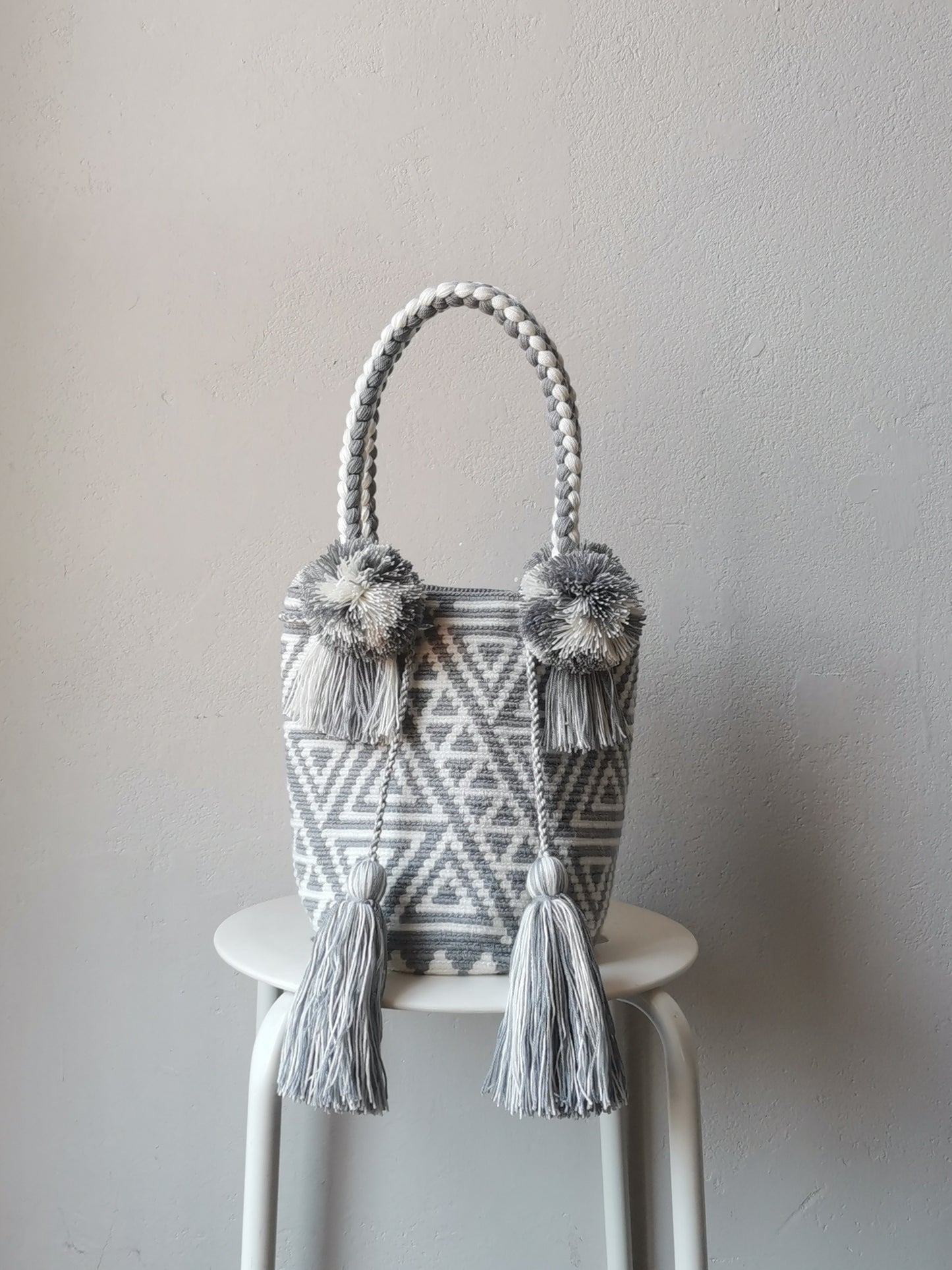 White and gray M mochila handbag