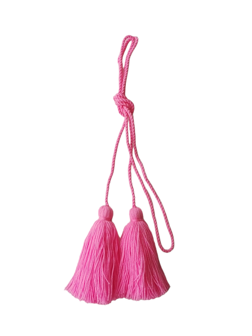 Shoulder bag with pink tassels