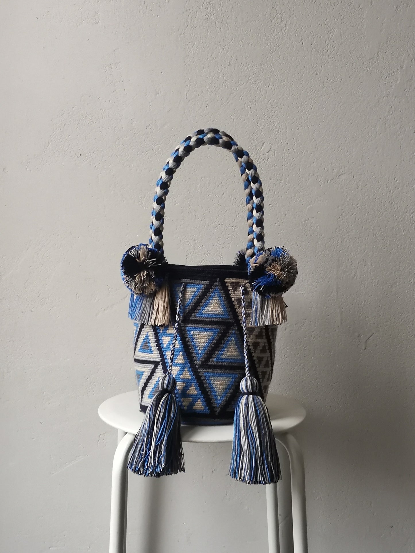M blue and gray mochila handbag