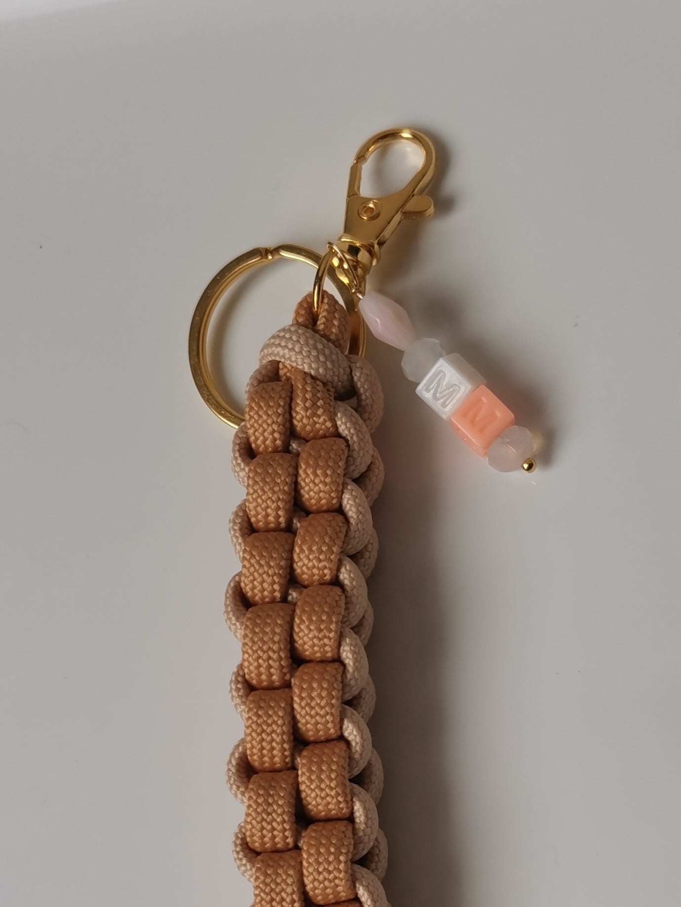 Charm per borse con nodo beige savana e beige