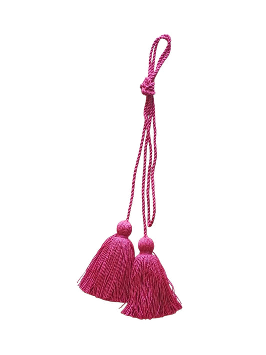 Bandoulière avec pompons cyclamen rose